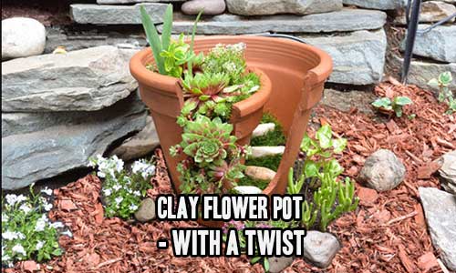 http://www.instructables.com/id/Clay-flower-pot-with-a-twist/